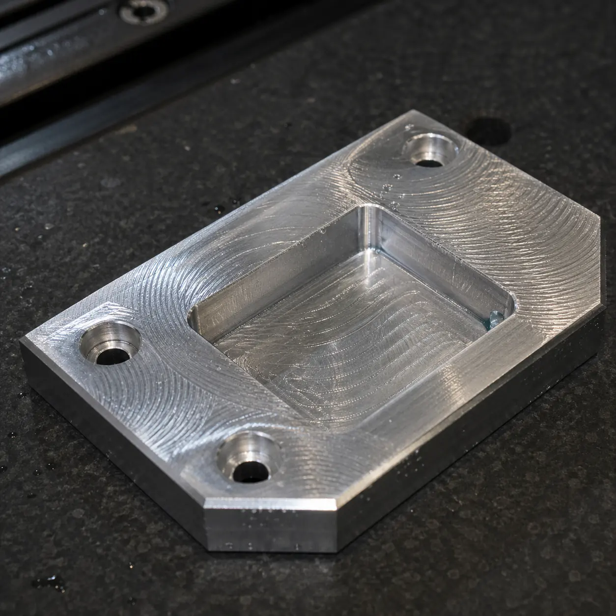 CNC-machined aluminum fixture plate for an automotive Tier 1 supplier in Mississauga