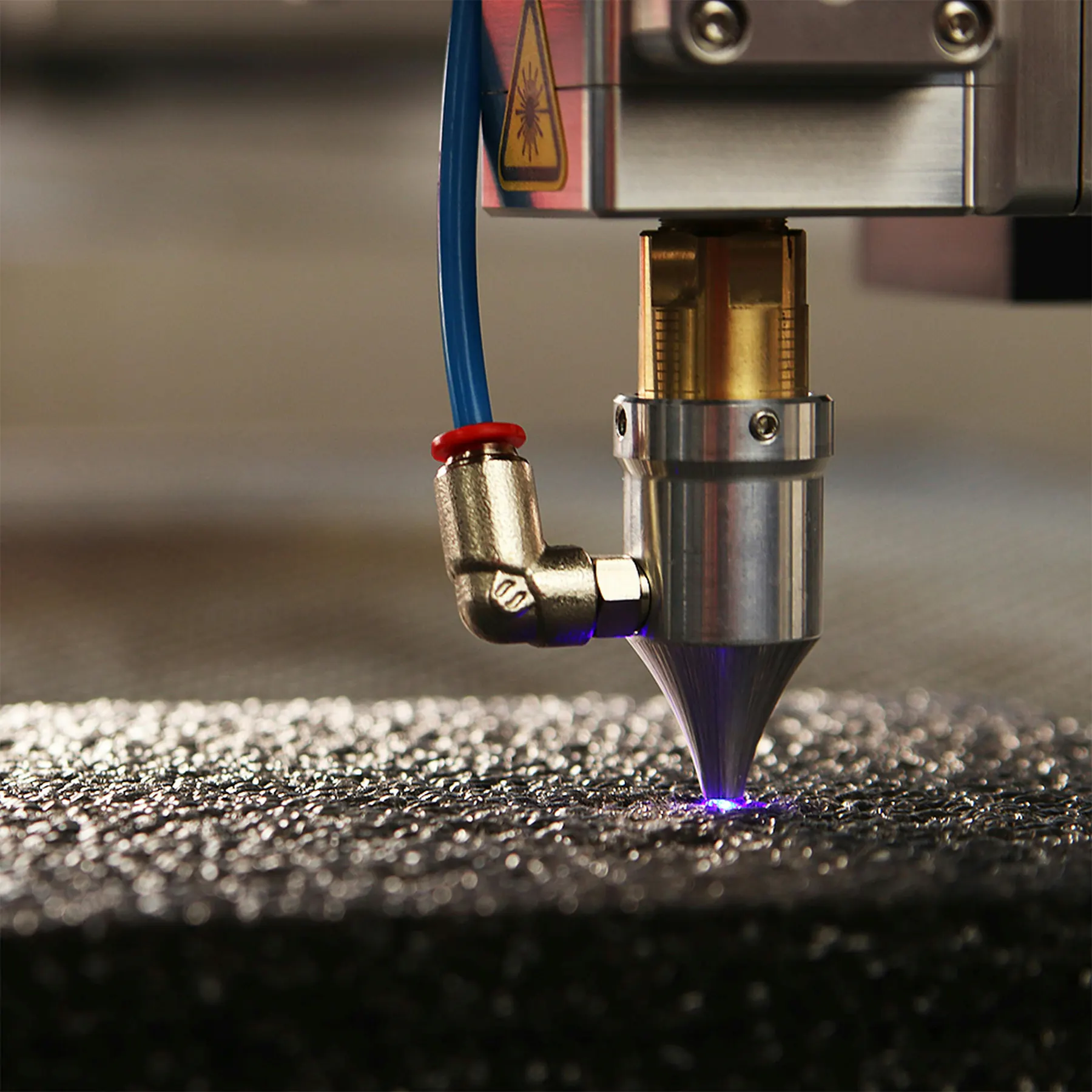 Laser cutting close-up with sparks